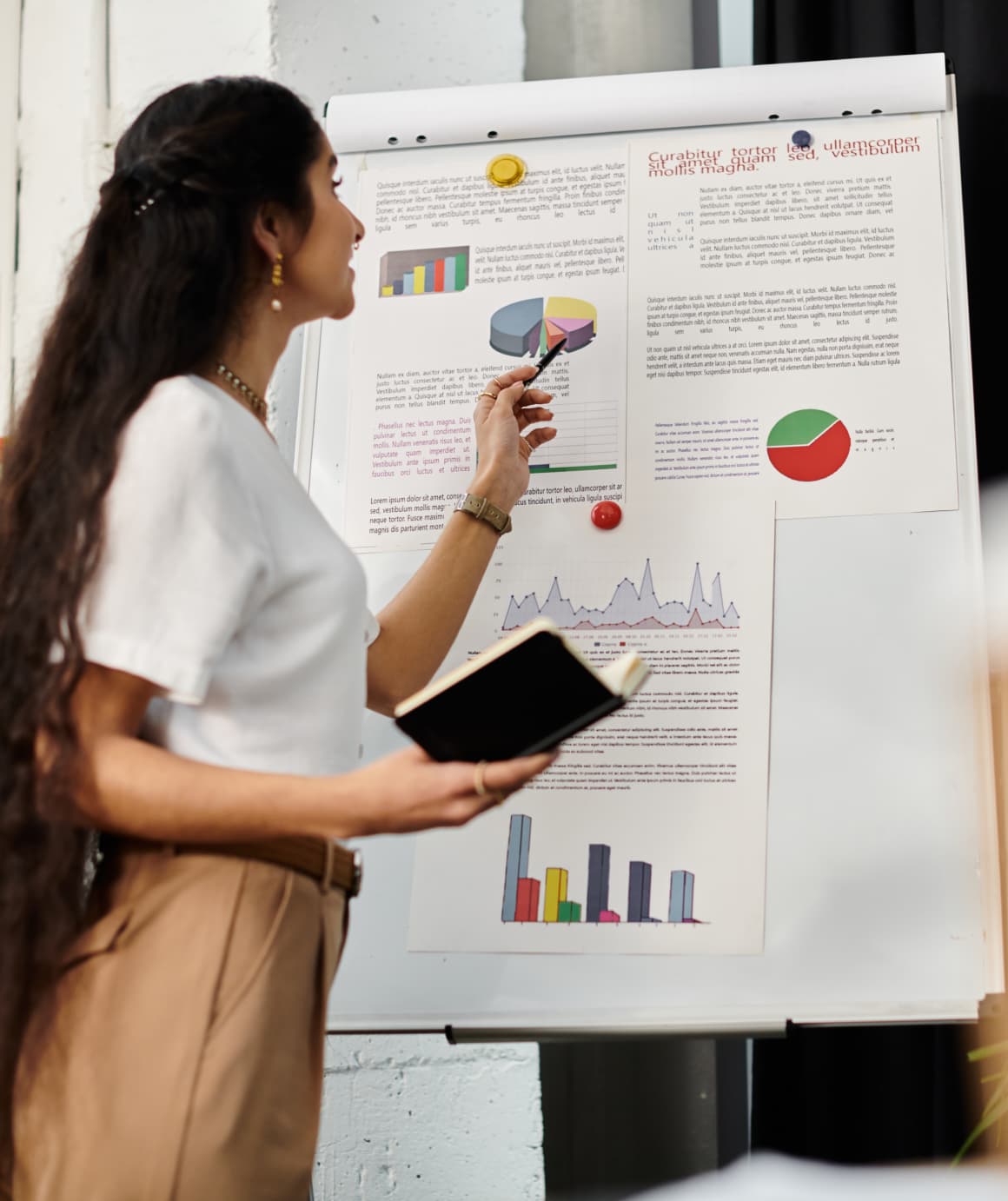 Woman giving presentation with charts